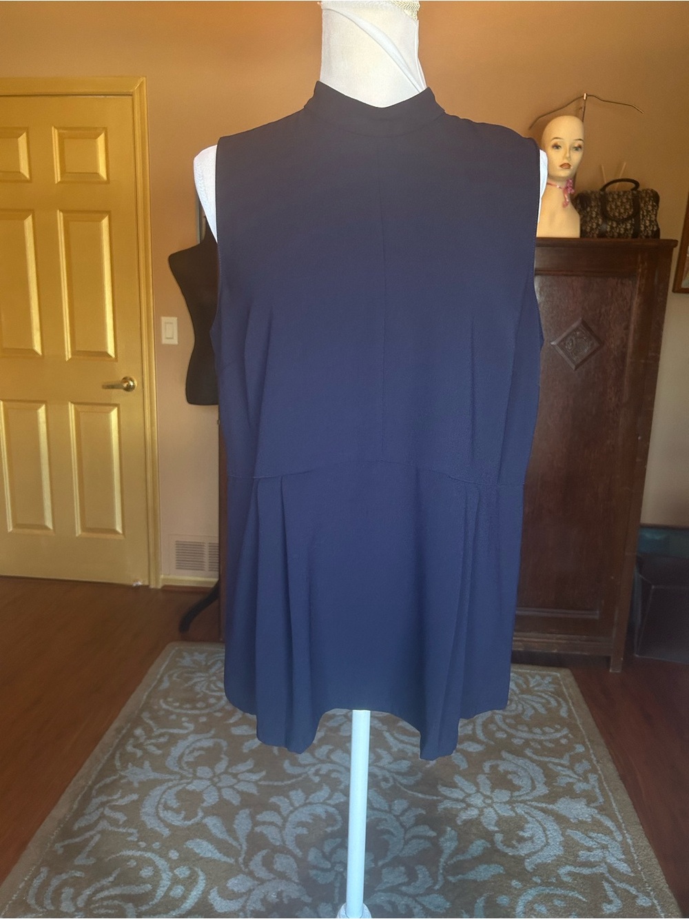 Ann Taylor mock turtleneck peplum Navy Blue blouse.